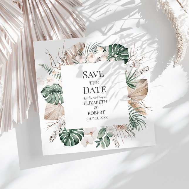 Tarjeta de Anuncio de Fecha de Tropical Orquídea y (Tropical Orchid and Monstera Save the Date Card on a sunny white table.)