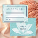 Tarjeta De Consejos Magnolia Azul Cristal Etéreo, Boda<br><div class="desc">Tarjeta de consejos de boda con una delicada flor de magnolia azul cristalino sobre un fondo floral abstracto del mismo tono junto con el título: "Consejos para la novia y el novio" en una elegante escritura de caligrafía,  rodeado de dos bordes finos.</div>