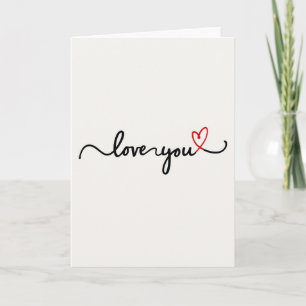 Tarjeta de corazón rojo con la escritura 'Te Amo'