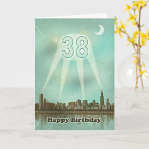 Tarjeta de cumpleaños 38 con luces y ciudad
