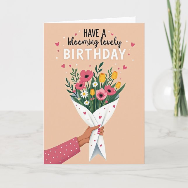 Tarjeta de cumpleaños con mano sosteniendo flores (Anverso)