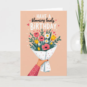 Tarjeta de cumpleaños con ramo floral en mano