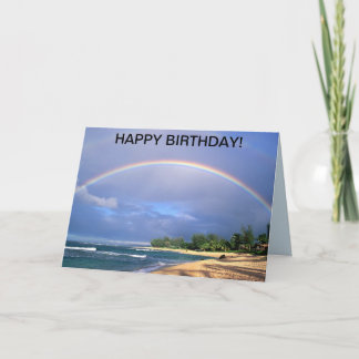 Tarjeta de cumpleaños con un arco iris a orillas d