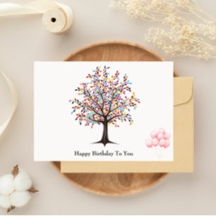 Tarjeta de cumpleaños de árbol de bonitos y globo