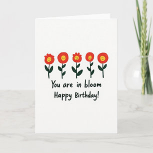 Tarjeta de cumpleaños de flores sonrientes