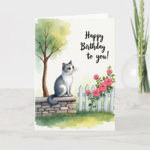 Tarjeta de cumpleaños de gato en el jardín alegre