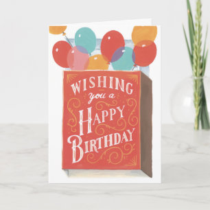 Tarjeta de cumpleaños de globos de colores y una c
