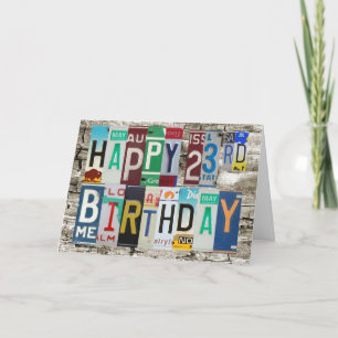 Tarjeta de cumpleaños feliz de las placas 23ro