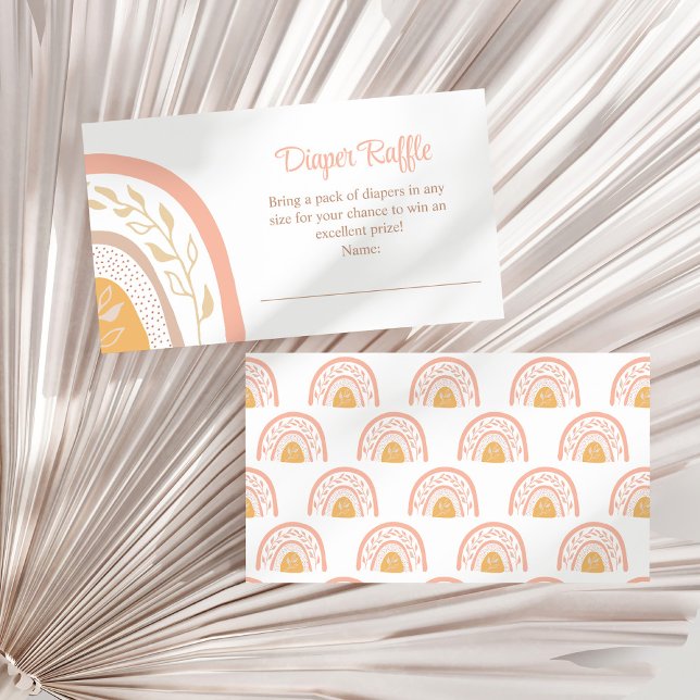 Tarjeta de envoltorio de barro del pañal arcoiris  (Boho PInk Rainbow Diaper Raffle Enclosure Card on a white dry palm leaf.)