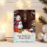 Tarjeta de escena navideña Snowman Vintage<br><div class="desc">Esto en una adorable tarjeta de felicitación de Navidades para enviarla a sus clientes, proveedores o clientes. La tarjeta muestra una escena de un lindo muñeco de nieve con regalos en la puerta principal de una casa en una imagen de acuarela vintage. Todo el texto de la tarjeta es personalizable....</div>