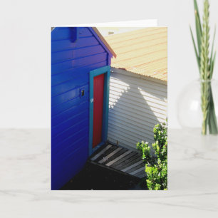 Tarjeta de felicitación azul de la puerta roja
