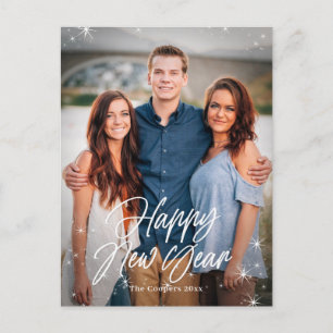 Tarjeta de felicitación de año nuevo con destellos