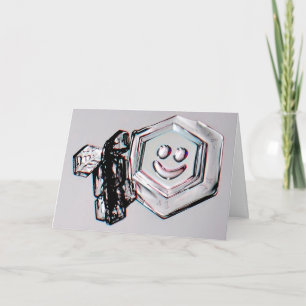 Tarjeta de felicitación de copo de nieve sonriente