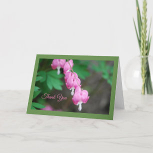 Tarjeta de felicitación de corazón sangrado rosado