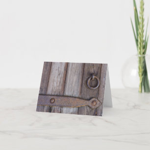 Tarjeta de felicitación de la manecilla de la puer