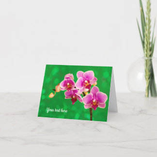 Tarjeta de felicitación de orquídea púrpura sobre
