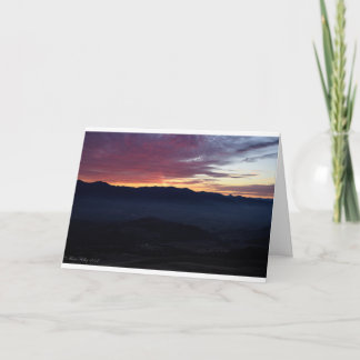 Tarjeta de felicitación de puesta de sol en blanco