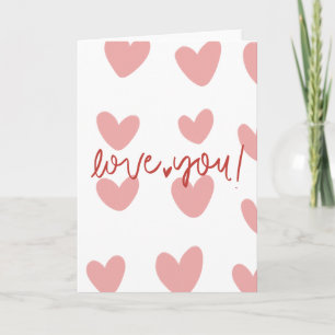 Tarjeta de felicitación elegante de corazones rosa