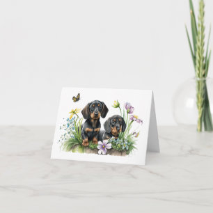 Tarjeta de felicitación en blanco de cachorros Dac
