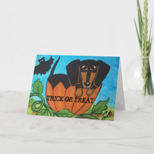 Tarjeta de felicitación negra de la calabaza de