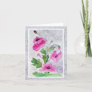 Tarjeta de felicitación plegada con flores rosadas