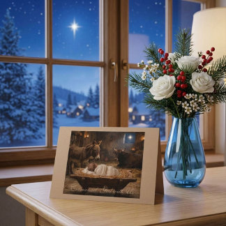 Tarjeta de Feliz Navidad con Niño en el Pesebre