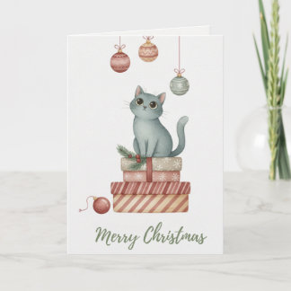 Tarjeta de gatito de Navidad en cajas de regalo