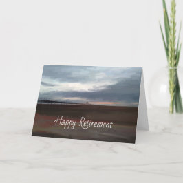 Tarjeta de jubilación en un muelle junto al mar