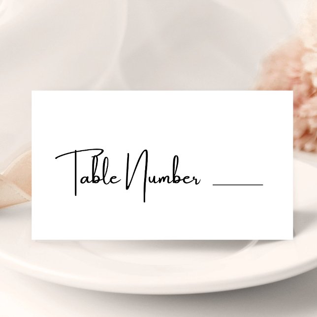 Tarjeta de lugar de boda elegante moderna en blanc (Elegant modern black and white place card adds style while guiding guests to their seats)