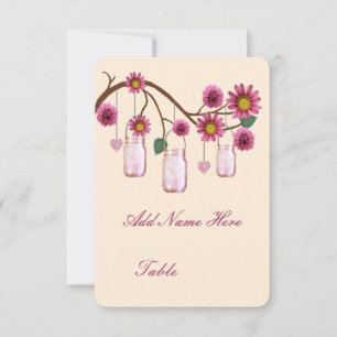 Tarjeta de lugar de mesa con frascos de flores ros