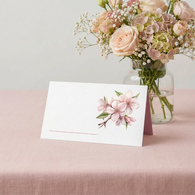 Tarjeta de lugar de nombre de tabla de floración d (Delicate floral table name place card features a soft pink blossom design.)