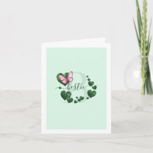 Tarjeta de mejor amiga con mariposa rosa y hojas e