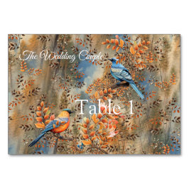 Tarjeta De Mesa Árboles altos, hojas otoñales y aves azules.