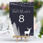 Tarjeta De Mesa Armada de venados de Woodland<br><div class="desc">Acompaña a tus huéspedes con un toque de elegancia en invierno. Estos números de las mesas, con un majestuoso ciervo en medio de un bosque nevado, le dan un toque rústico a su recepción. El borde azul marino se completa con el entorno natural, creando un toque sofisticado. Cada número de...</div>