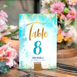 Tarjeta De Mesa Bat Mitzvah Turquoise Watercolor Girona Guión dora<br><div class="desc">Ningún fiesta de Bat Mitzvah está completo sin tarjetas de número de tabla personalizadas. Que tu favorita Bat Mitzvah esté orgullosa, se regocije y celebre su hito en su fiesta perfectamente coordinada. Impresionante, moderno, brillante Relieve metalizado de imitación manuscrito y pequeños puntos sobre el fondo de una acuarela azul turquesa....</div>