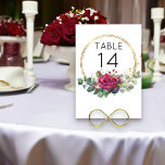 Tarjeta De Mesa Boda de anillos geométricos Red Rose Gold<br><div class="desc">Las tarjetas de la mesa boda de rosa rojo imprimen los anillos de oro, el marco geométrico y una hermosa acuarela floral de la flor de la rosa roja eucalipto hojas de vegetación y un toque de confeti dorado. Si quieres este diseño para productos a juego, por favor envíame un...</div>