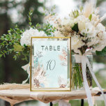 Tarjeta De Mesa Boda de Aqua Ocean & Shells<br><div class="desc">Sumérjase en el encanto del amor con nuestra cautivadora suite boda subacuática. Contra un impresionante fondo turquesa de agua pálida que evoca la serenidad del mar, una textura submarina añade profundidad y dimensión al diseño. La carta con el número de la mesa boda está decorada con una delicada gama de...</div>