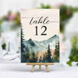 Tarjeta De Mesa Boda De Montañas Y Pinos De Acuarela<br><div class="desc">Mejora tu recepción de bodas con estos números de tabla de serenidad. Con un paisaje acuático de ensueño, montañas majestuosas y pinos, estas cartas le dan un toque de belleza natural y tranquilidad a su mesa. Personalice los números de su tabla para obtener un toque único que complemente su tema...</div>