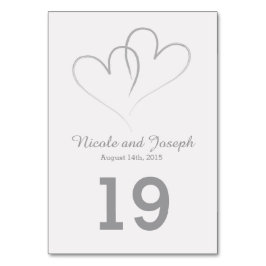 Tarjeta de mesa boda - Dos corazones plateados ent