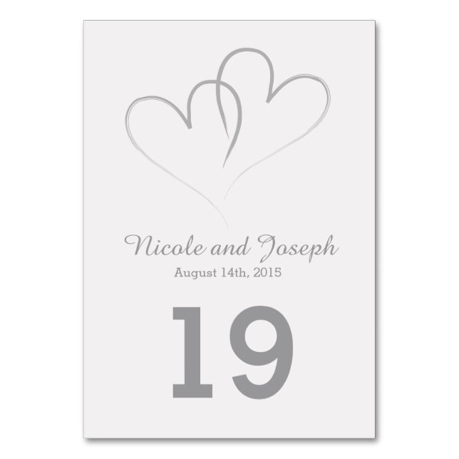 Tarjeta de mesa boda - Dos corazones plateados ent (Anverso)
