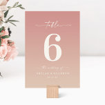 Tarjeta De Mesa Boda Monogramado Dusty Pink & Champagne Ombre<br><div class="desc">Dusty Pink & Champagne Ombre Monogramed Wedding Cines De La Mesa. Esta moderna tarjeta de mesa de moda es simple, clásica y elegante, con un suave degradado oscuro y un tipo de letra caligrafía con bonito con cruz. Mostrado en la nueva autopista. Disponible en varias opciones de color, o no...</div>