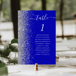 Tarjeta De Mesa Boda Purpurina Royal Blue Silver<br><div class="desc">El borde izquierdo de esta elegante y moderna tarjeta boda número de mesa cuenta con un purpurina falso plateado. La palabra "tabla" aparece en un guión de escritura manual caprichosa y blanca sobre un fondo azul real. Añadir los nombres de los invitados asignados a cada tabla</div>