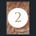 Tarjeta De Mesa Boda Rustic Wood<br><div class="desc">Este diseño presenta un fondo rústico de madera. El sencillo fondo de madera marrón se complementa con el texto blanco y el moderno elemento de círculo central limpio que rodea el título. Los tonos marrones de los granos de madera crean un ambiente rústico de jardín de bosques. Elegante número de...</div>