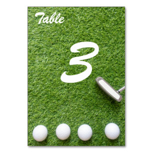 Tarjeta De Mesa Bolas de golf y púter sobre hierba verde