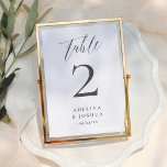 Tarjeta De Mesa Caligrafía de llamada de guión minimalista elegant<br><div class="desc">Una tarjeta de número de mesa para combinar con nuestra colección de Bodas de Fotos en Blanco y Negro. Este diseño presenta tipografía serif clásica, letra script elegante y un diseño de tipografía moderno. En la parte superior, "table" está escrito en caligrafía. A continuación, sus nombres y los detalles están...</div>