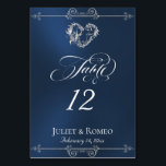 Tarjeta De Mesa Calligraphy & Silver Heart - Blue Table Number<br><div class="desc">The design features an elegant blue background embellished with scroll borders, a heart and placeholders for the table number, couple's names and date of event. Available in several colors for your wedding theme. (Glitter is simulated in the artwork). Designed to coordinate with the Romantic Scroll Hearts & Calligraphy Wedding Collection....</div>