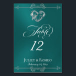 Tarjeta De Mesa Calligraphy & Silver Heart - Teal Table Number<br><div class="desc">The design features an elegant teal background embellished with scroll borders, a heart and placeholders for the table number, couple's names and date of event. Available in several colors for your wedding theme. Designed to coordinate with the Romantic Scroll Hearts & Calligraphy Wedding Collection. To change details, click «Personalize». To...</div>