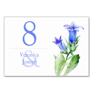 Tarjeta de mesa de boda con campanilla azul flor s