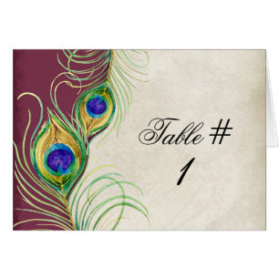 Tarjeta de mesa de boda con plumas de pavo real fr