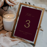 Tarjeta De Mesa Delicada caligrafía de oro | Tabla de Borgoña No.<br><div class="desc">Esta delicada caligrafía dorada de la mesa burdeos no. el número de la mesa es perfecto para un boda moderno. El romántico diseño minimalista presenta una encantadora y elegante tipografía de champán amarillo dorado sobre un fondo rojo burdeos con un aspecto limpio y sencillo. La tarjeta se imprime en la...</div>